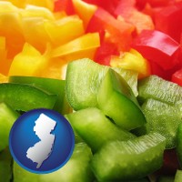 nj map icon and sliced and diced green, red, and yellow peppers