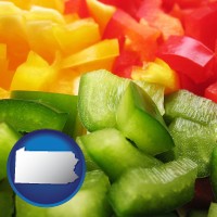 pennsylvania map icon and sliced and diced green, red, and yellow peppers